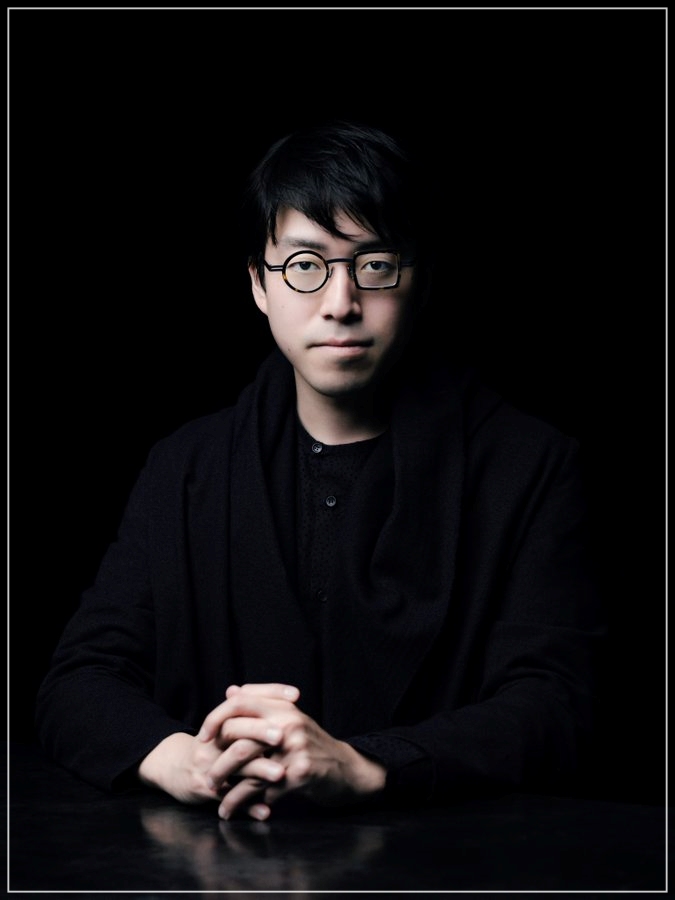成田悠輔